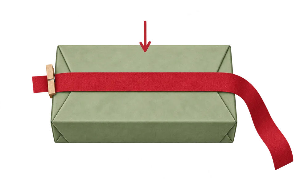 Lay ribbon across the lid with a short tail.