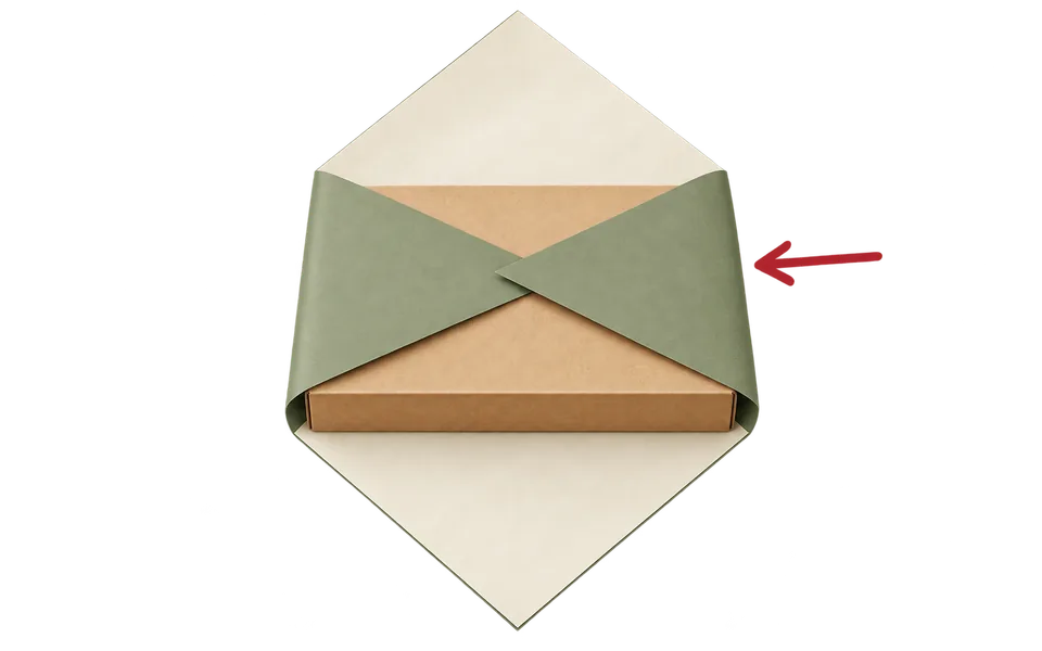 Fold the left and right points over the box.