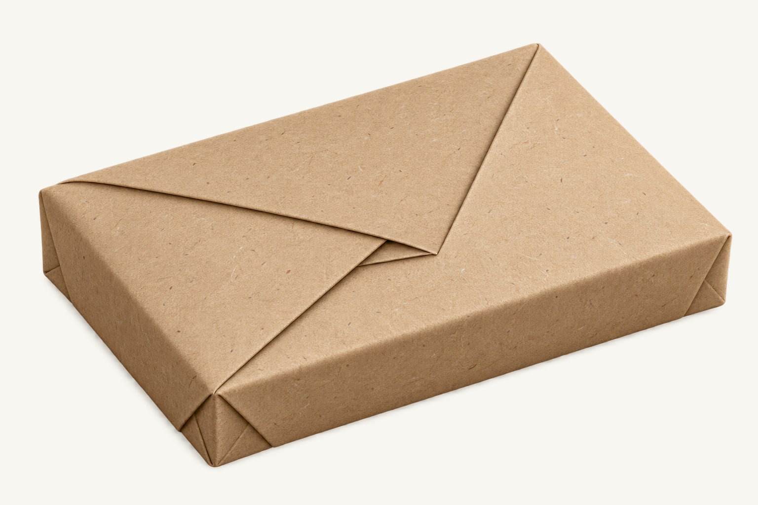 A box wrapped diagonally in kraft paper, its folded corners meeting on top