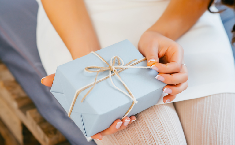 Bride opening a wedding gift